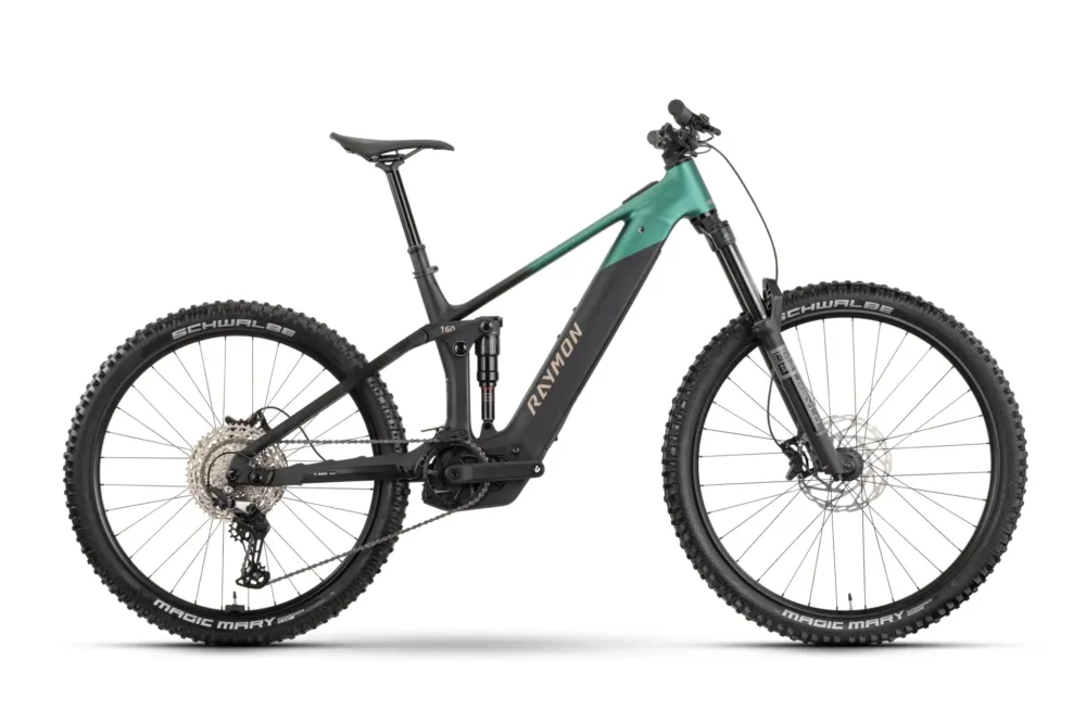 Aktuell Raymon Vamok Comp 29/27.5" x12S Deore black/green 2026 - M